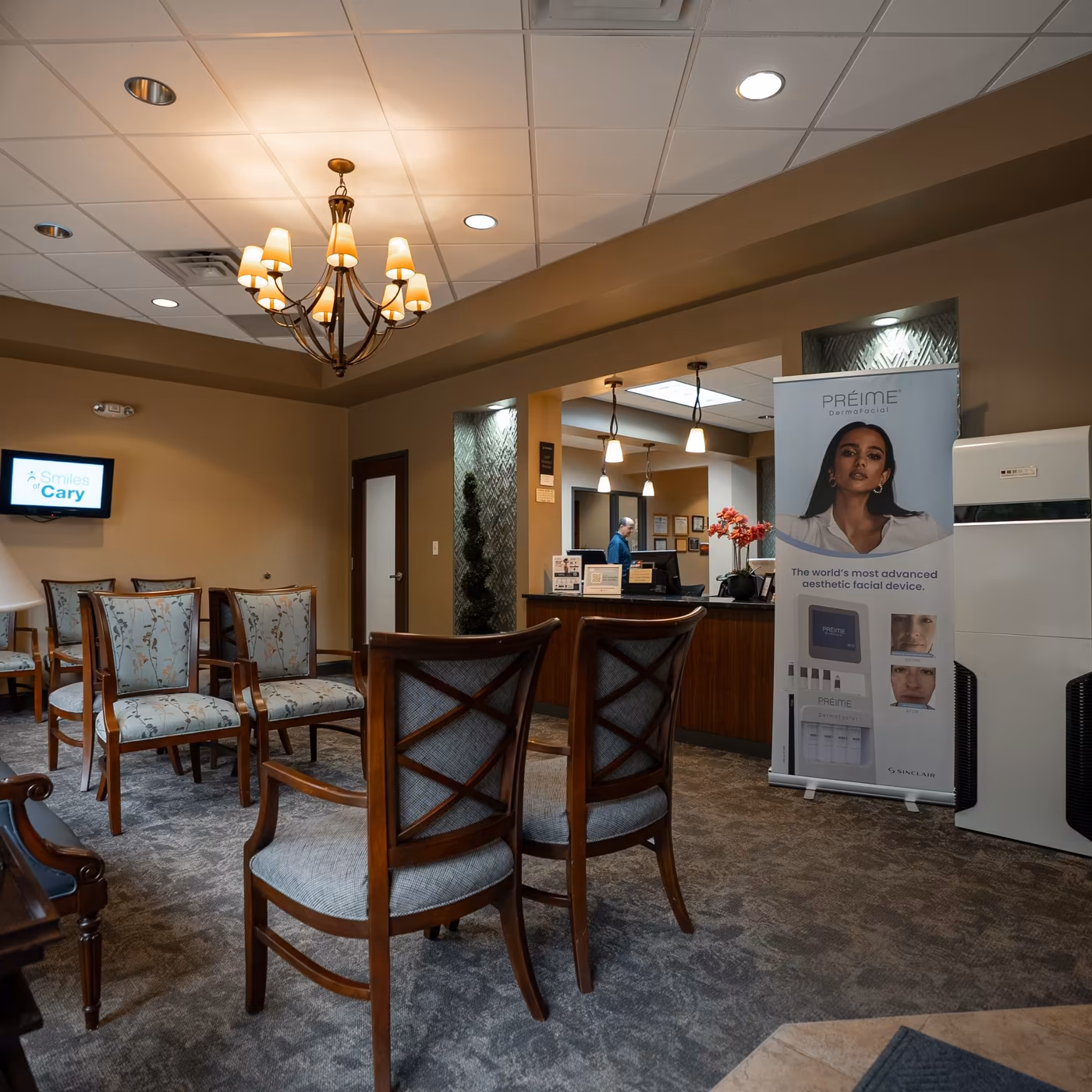 The reception desk and waiting room at Smiles of Cary in Cary, NC